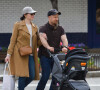 Exclusif - Laura Prepon et son fiancé Ben Foster se baladent avec leur fille en poussette à New York, le 29 avril 2018.