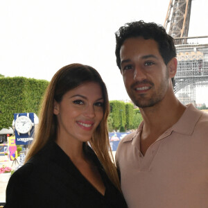 Iris Mittenaere et son compagnon Diego El Glaoui assistent au Longines Paris Eiffel Jumping au Champ de Mars © Veeren / Bestimage 