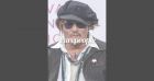 Johnny Depp, un style unique à Deauville : il se grille une cigarette en conférence de presse