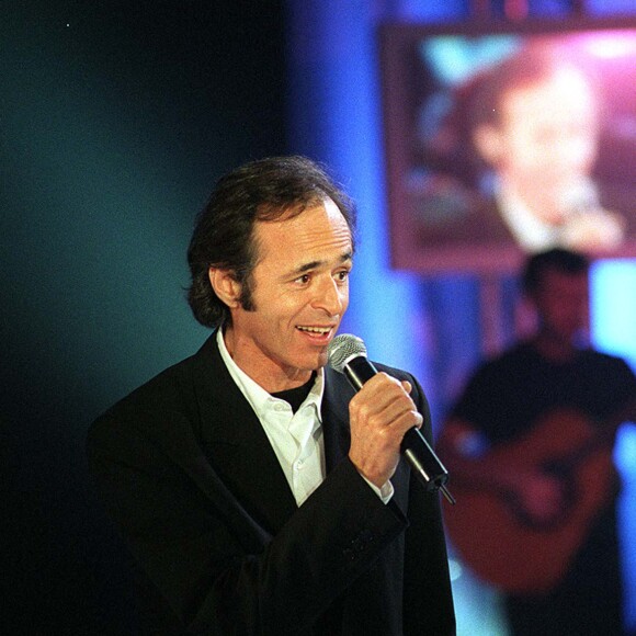 Jean-Jacques Goldman et Charles Aznavour en concert à Paris.