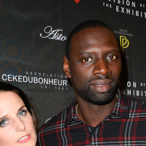 Omar Sy et sa femme Hélène au vernissage de l'exposition "Vision by AG", au profit de l'association caritative CeKeDuBonheur, à la Piscine Molitor à Paris, le 30 novembre 2016. © Guirec Coadic/Bestimage 