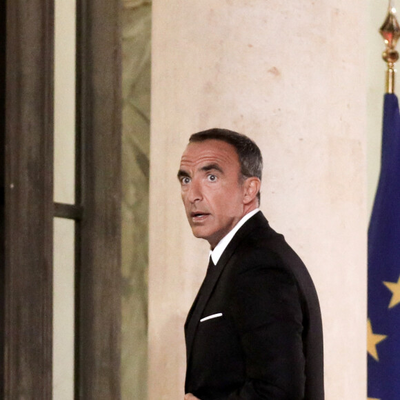 Nikos Aliagas - Le président de la République et la première dame recoivent le Premier ministre de la République Hellénique et son épouse pour un diner de travail, au palais de l'Elysée, Paris, le 27 septembre 2021. © Stéphane Lemouton / Bestimage 