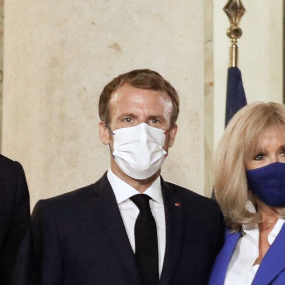 Le président de la République, Emmanuel Macron et la première dame, Brigitte Macron recoivent le premier ministre de la République Hellénique et son épouse pour un diner de travail, au palais de l'Elysée, Paris, le 27 septembre 2021. © Stéphane Lemouton / Bestimage 
