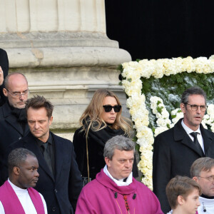 Tony Scotti, Jean-Jacques Debout, Sylvie Vartan, David Hallyday, Laura Smet, le père Guy Gilbert, Mgr Benoist de Sinety - Sorties de l'église de la Madeleine après les obsèques de Johnny Hallyday à Paris le 9 décembre 2017. © Veeren / Bestimage