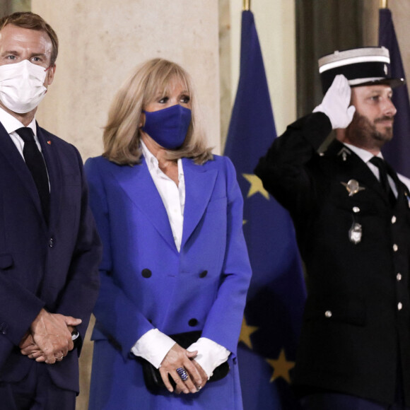 Le président de la République, Emmanuel Macron et la première dame, Brigitte Macron recoivent le premier ministre de la République Hellénique et son épouse pour un diner de travail, au palais de l'Elysée, Paris, le 27 septembre 2021. © Stéphane Lemouton / Bestimage 