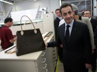 Un sac pour Nicolas Sarkozy en visite chez Vuitton : Ca va faire plaisir à Carla, elle aurait bien aimé venir... (réactualisé)