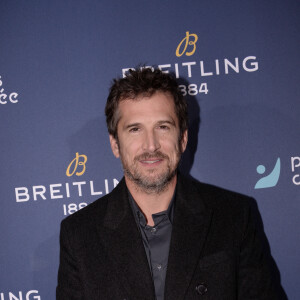 Exclusif - Guillaume Canet - Dîner de charité Breitling pour l'association "Premiers de cordée" à la Samaritaine à Paris le 8 octobre 2021. © Rachid Bellak / Bestimage 