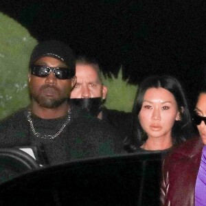 Kim Kardashian et Kanye West à la sortie du restaurant "Nobu" à Los Angeles, le 30 septembre 2021.