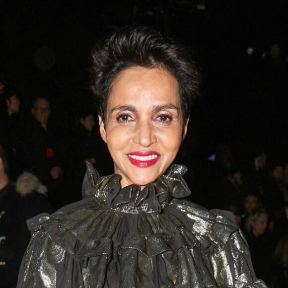 Farida Khelfa assiste au défilé de mode Saint Laurent, collection prêt-à-porter automne-hiver 2020/2021, à la Tour Eiffel. Paris, le 25 février 2020.