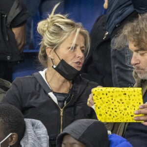 Patrick Puydebat et sa compagne Caroline - Qualification pour la Coupe du monde 2022 entre la France et le Kazakhstan au Parc des Princes à Paris, le 13 novembre 2021. © Cyril Moreau/Bestimage