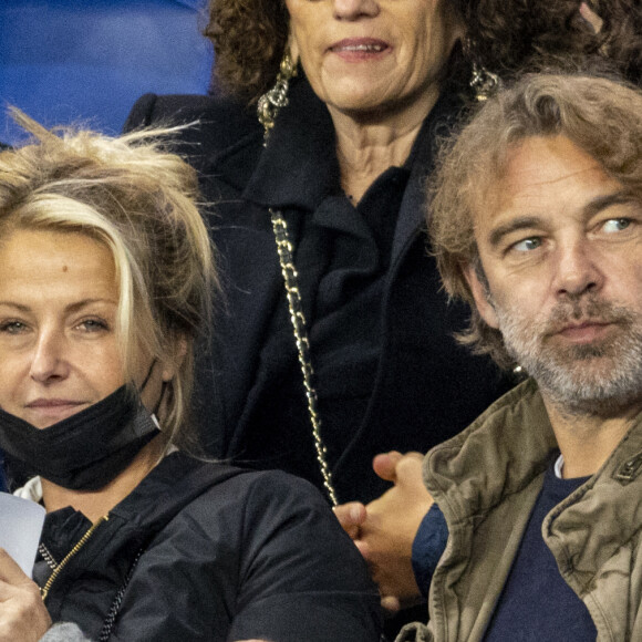 Patrick Puydebat et sa compagne Caroline - Qualification pour la Coupe du monde 2022 entre la France et le Kazakhstan au Parc des Princes à Paris, le 13 novembre 2021. © Cyril Moreau/Bestimage