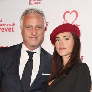 David Ginola et sa compagne Maeva Denat arrivent à la soirée "The Beating Hearts Ball" à Londres, le 27 février 2019.