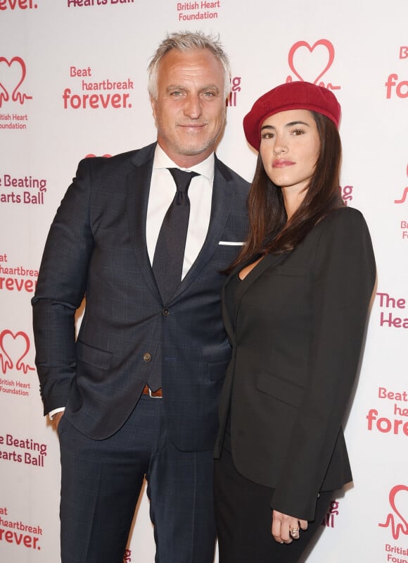 David Ginola et sa compagne Maeva Denat arrivent à la soirée "The Beating Hearts Ball" à Londres, le 27 février 2019.