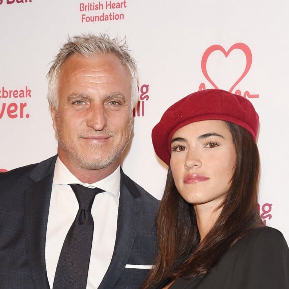 David Ginola et sa compagne Maeva Denat arrivent à la soirée "The Beating Hearts Ball" à Londres, le 27 février 2019.