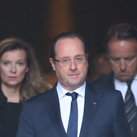 Valerie Trierweiler, Francois Hollande et Jean Pierre Bel - Sortie des obseques de Patrice Chereau en l'eglise Saint-Sulpice a Paris. Le 16 octobre 2013