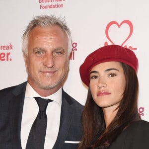 David Ginola et sa compagne Maeva Denat arrivent à la soirée "The Beating Hearts Ball" à Londres, le 27 février 2019.