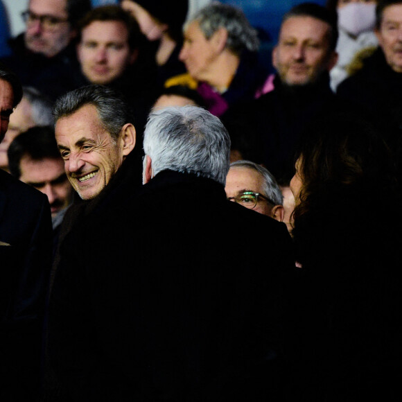 Jean Claude Blanc (directeur général PSG) - Nicolas Sarkozy dans les tribunes lors du match de Ligue 1 Uber Eats "PSG - Nantes(3-1)" au stade du Parc des Princes à Paris, le 20 novembre 2021.