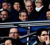 Nicolas Sarkozy - Jean Claude Blanc (directeur général PSG) - Leonardo Nascimento de Araujo (directeur sportif PSG) - dans les tribunes lors du match de Ligue 1 Uber Eats "PSG - Nantes(3-1)" au stade du Parc des Princes à Paris, le 20 novembre 2021.
