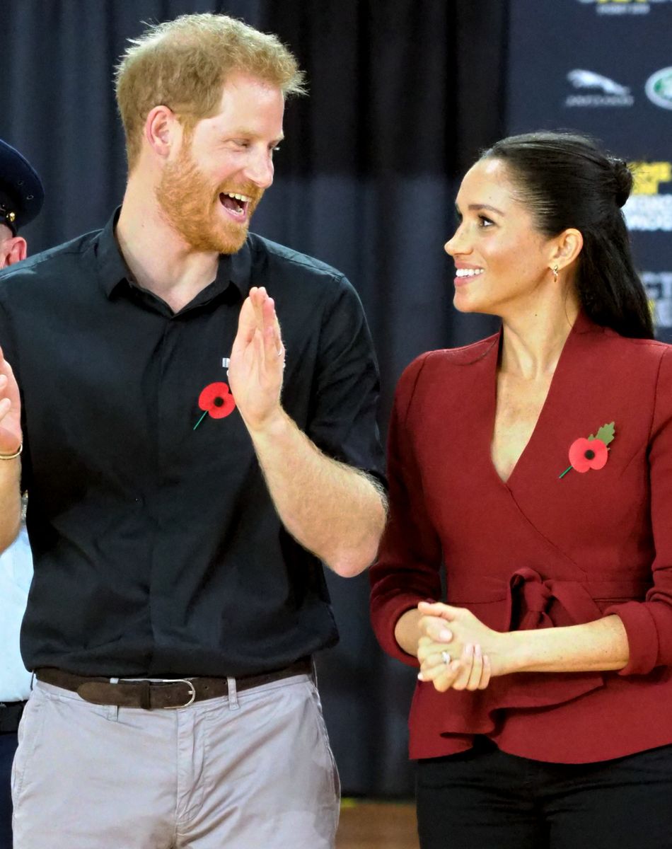 Le prince Harry, duc de Sussex, et Meghan Markle, duchesse de Sussex, enceinte de son fils Archie, assistent à la finale de basketball en fauteuil roulant aux Invictus Games à Sydney.
