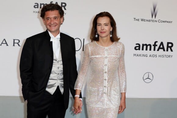 Carole Bouquet et son compagnon Philippe Sereys de Rothschild - Photocall de la soirée "AmfAR's 21st Cinema Against AIDS" à l'Eden Roc au Cap d'Antibes lors du 67ème festival du film de Cannes, le 22 mai 2014.