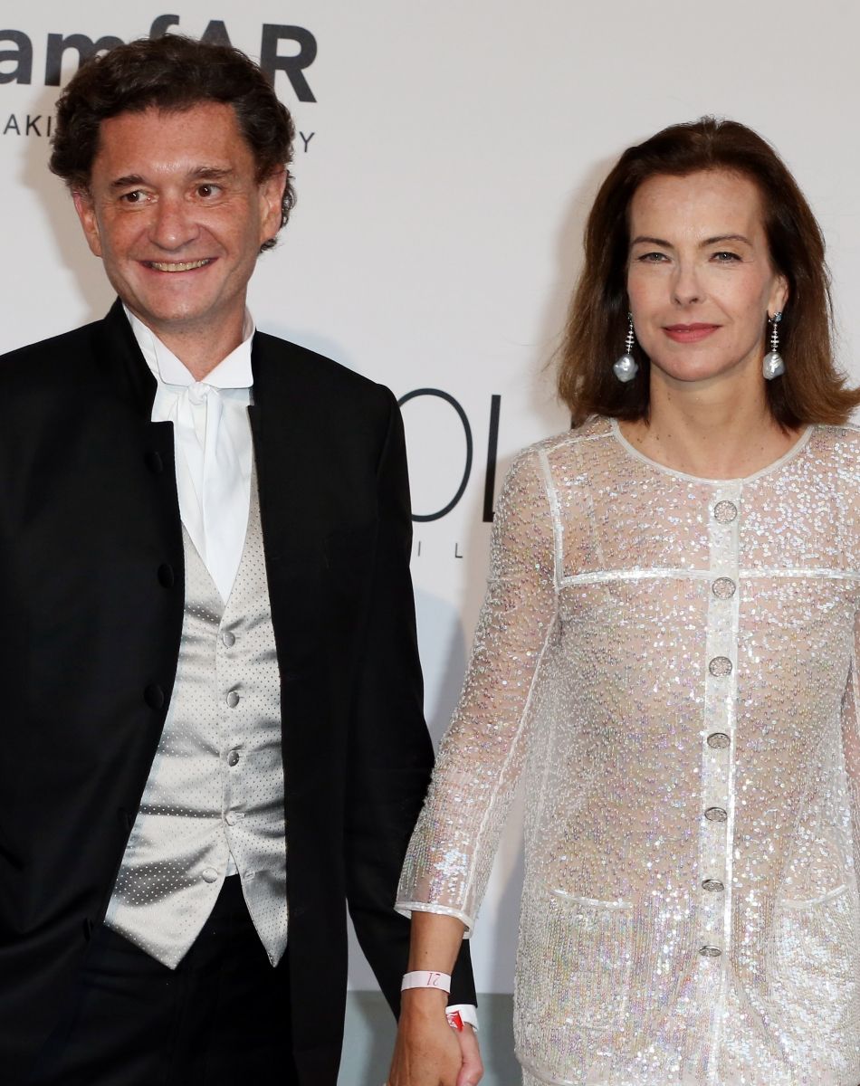 Carole Bouquet et son compagnon Philippe Sereys de Rothschild - Photocall de la soirée "AmfAR's 21st Cinema Against AIDS" à l'Eden Roc au Cap d'Antibes lors du 67ème festival du film de Cannes, le 22 mai 2014.