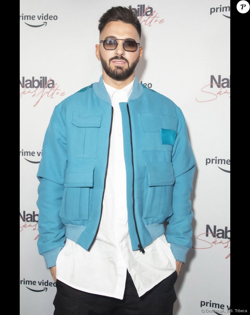 Exclusif - Thomas Vergara - Nabilla Benattia, son mari Thomas Vergara et leur fils Milann posent lors de l'avant première du documentaire "Nabilla sans filtre" (Amazon Prime Vidéo) à Paris le 22 Novembre 2021. © Jack Tribeca / Bestimage
