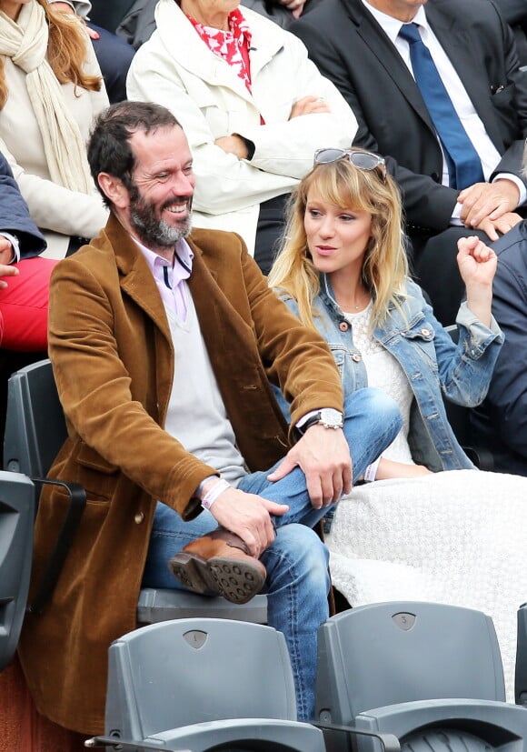Christian Vadim et sa femme Julia - People dans les tribunes des Internationaux de France de tennis de Roland Garros à Paris. Le 31 mai 2015.