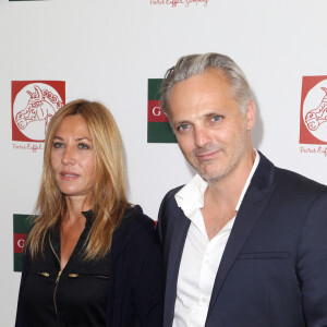 Exclusif - Mathilde Seigner et son compagnon Mathieu Petit - Longines Global champions tour Paris Eiffel Jumping présenté par Gucci, au Champ de Mars à Paris le 6 juillet 2014.