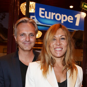 Mathilde Seigner et son compagnon Mathieu Petit - Arrivee des people a la generale de Muriel Robin "Robin Revient" au Theatre de la Porte Saint Martin a Paris, le 23 septembre 2013.