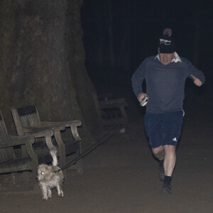 Le Premier ministre Boris Johnson fait son jogging avec son Jack Russell "Dilyn" dans le centre de Londres, Royaume Uni, le 26 janvier 2022.