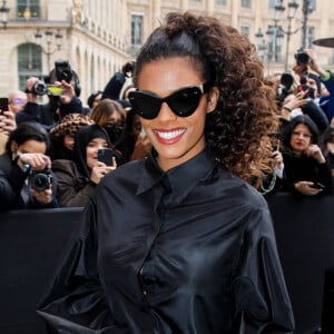 Tina Kunakey arrive au défilé Valentino Haute-Couture printemps-été 2022 au 8 place Vendôme dans le cadre de la Fashion Week de Paris © Veeren-Clovis/Bestimage