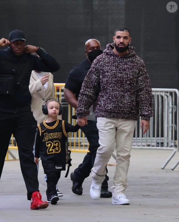 Drake et son fils Adonis à leur arrivée au Staples Center à Los Angeles, pour assister au match des Lakers Vs Phoenix Suns. Le 3 juin 2021 