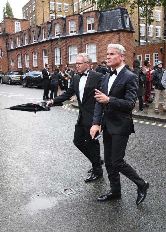 David Coulthard, l'ancien pilote écossais de Formule 1 de 50 ans, assiste à l'avant-première mondiale du nouvel opus de James Bond "No Time to Die" au Royal Albert Hall à Londres, le 28 septembre 2021.