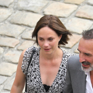 Jean Dujardin et sa femme Nathalie Péchalat lors de la cérémonie d'hommage national à Jean-Paul Belmondo à l'Hôtel des Invalides à Paris, France, le 9 septembre 2021. © Dominique Jacovides/Bestimage