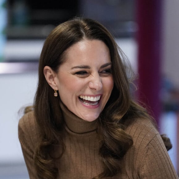 Le prince William, duc de Cambridge, et Catherine (Kate) Middleton, duchesse de Cambridge, rencontrent des bénévoles de l'Eglise "Church on The Street" à Burnley, le 20 janvier 2022.