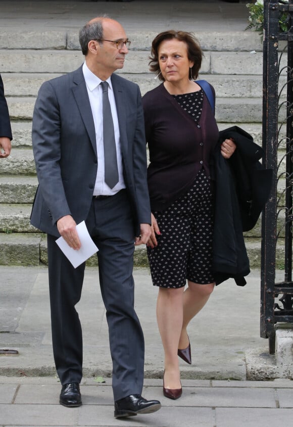 Eric Woerth et sa femme Florence - Sorties des obsèques de Patrice Dominguez en la basilique Sainte Clotilde à Paris. Le 16 avril 2015