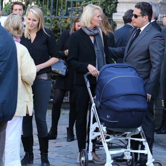 Marion Maréchal-Le Pen et sa mère Yann Le Pen - Obsèques de Roger Auque en l'église Saint-Germain-des-Près à Paris le 12 septembre 2014.