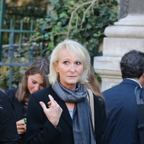 Marion Maréchal-Le Pen et sa mère Yann Le Pen - Obsèques de Roger Auque en l'église Saint-Germain-des-Près à Paris le 12 septembre 2014.