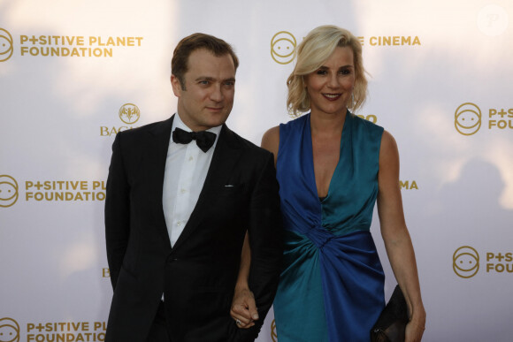 Laurence Ferrari et son mari Renaud Capuçon - Photocall de la soirée de la fondation Positive Planet au Palm Beach lors du 70ème festival de Cannes le 24 mai 2017. 