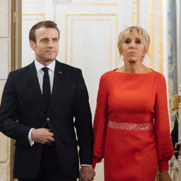 Le président de la République française Emmanuel Macron et sa femme la Première Dame Brigitte Macron lors du dîner d'Etat au palais de l'Elysée à Paris, France, le 25 mars 2019. © Lewis Joly/Pool/Bestimage 