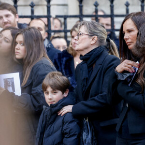 Nathalie Marquay et son fils Tom - La famille de Jean-Pierre Pernaut à la sortie des obsèques en la Basilique Sainte-Clotilde à Paris le 9 mars 2022. © Cyril Moreau/Bestimage