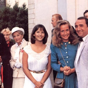 Archives - Sophie Marceau, Brigitte Fossey, Claude Brasseur sur le tournage du film "La boom 2". 1982.