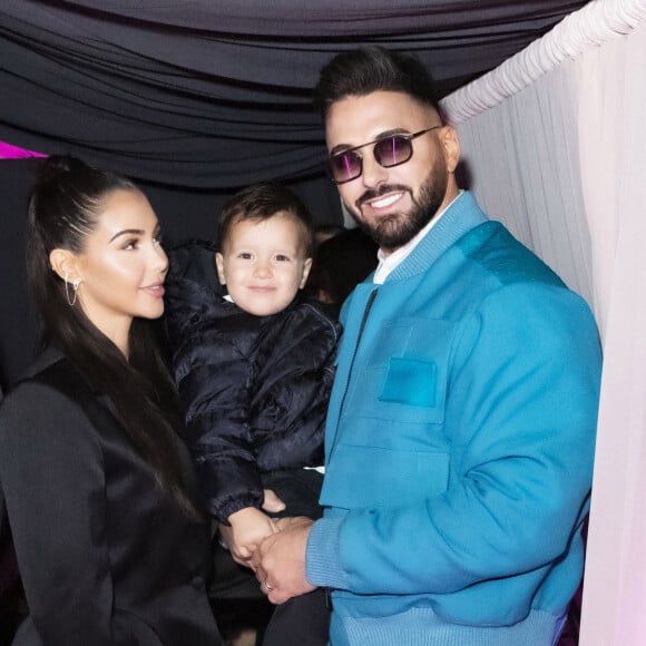 Exclusif - Nabilla Benattia, son mari Thomas Vergara et leur fils Milann posent lors de l'avant première du documentaire "Nabilla sans filtre" (Amazon Prime Vidéo) à Paris le 22 Novembre 2021. © Jack Tribeca / Bestimage 