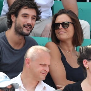 Laure Manaudou et son compagnon Jérémy Frérot dans les tribunes lors de la finale des Internationaux de tennis de Roland-Garros à Paris, le 7 juin 2015.