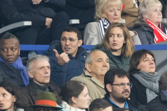 Brahim Asloum et sa femme Justine Pouget assistent à la rencontre de rugby opposant la France à l'Angleterre, au stade de France, dans le cadre du Tournoi des Six Nations. Saint-Denis, le 19 mars 2022. © Cyril Moreau/Bestimage