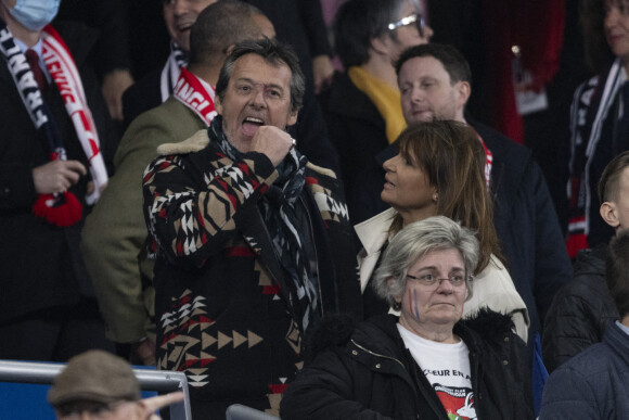 Jean-Luc Reichmann et son épouse Nathalie Lecoultre assistent à la rencontre de rugby opposant la France à l'Angleterre, au stade de France, dans le cadre du Tournoi des Six Nations. Saint-Denis, le 19 mars 2022. © Cyril Moreau/Bestimage