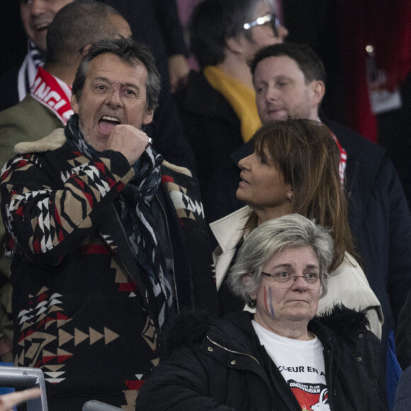 Jean-Luc Reichmann et son épouse Nathalie Lecoultre assistent à la rencontre de rugby opposant la France à l'Angleterre, au stade de France, dans le cadre du Tournoi des Six Nations. Saint-Denis, le 19 mars 2022. © Cyril Moreau/Bestimage