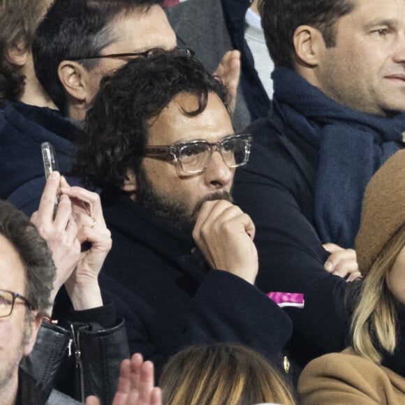 Maxim Nucci (Yodelice) et sa compagne Isabelle Ithurburu assistent à la rencontre de rugby opposant la France à l'Angleterre, au stade de France, dans le cadre du Tournoi des Six Nations. Saint-Denis, le 19 mars 2022. © Cyril Moreau/Bestimage