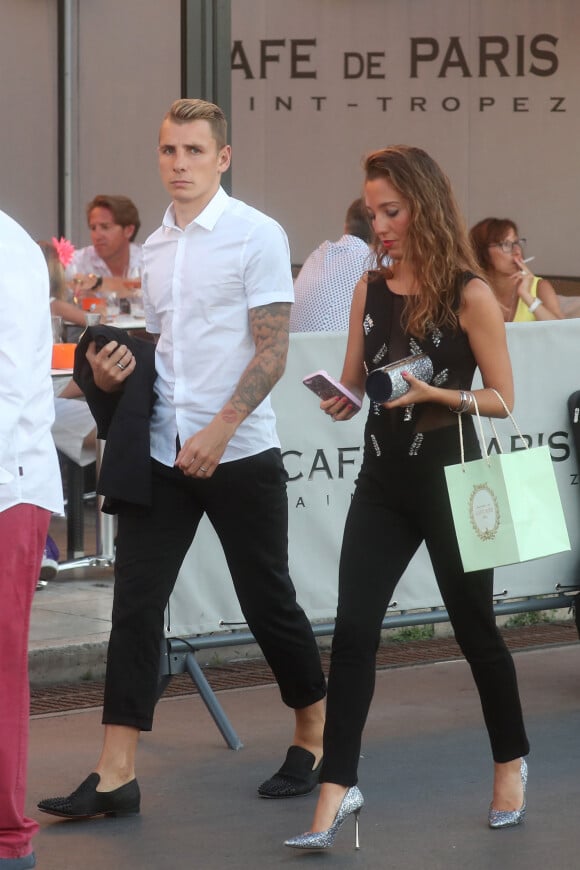 Exclusif - Le nouveau joueur du FC Barcelone Lucas Digne et sa femme Tiziri dans les rues de Saint-Tropez le 29 juillet 2016