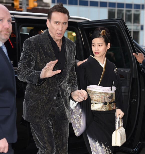 Nicolas Cage et sa femme Riko Shibata - Arrivées à la projection du film "The Unbearable Weight of Massive Talent" à New York le 10 avril 2022.  New York City, NY - Celebrities arrive for '"The Unbearable Weight of Massive Talent"' screening in New York City.